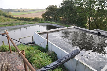 drained-water-is-stored-to-be-returned-to-windrow