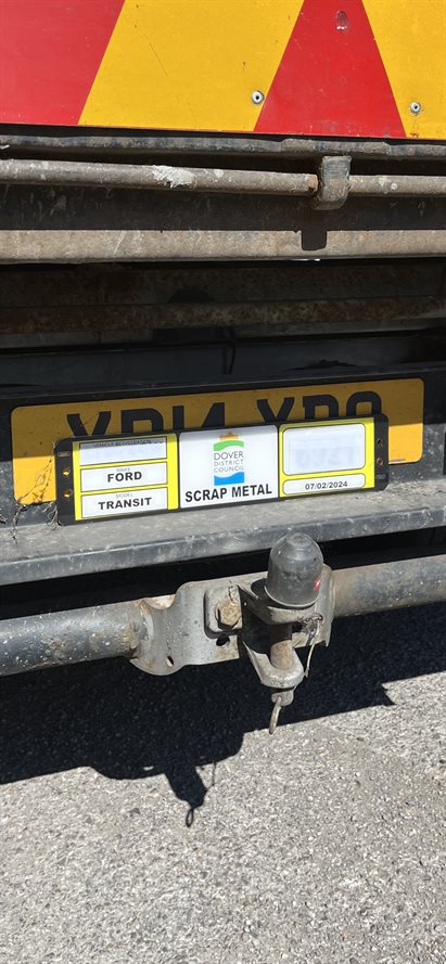 Photograph of a Dover District Council licence plate for scrap metal collectors, located at the rear of the vehicle.