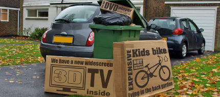 carboard boxes put out for binmen